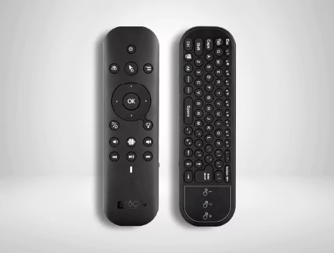 Two black zepp remote for a Cosmos outdoor TV.