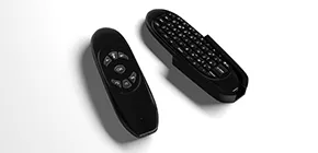 Two black remote controls with a built-in keyboard to navigate your outdoor TV.