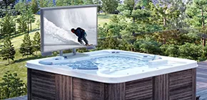 A hot tub with a Cosmos Outdoor TV in your patio.