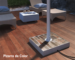 Snippet of a colored slate stand for an outdoor TV on a wooden deck board floor.