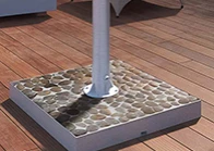 Stone base floor-mounted outdoor TV.