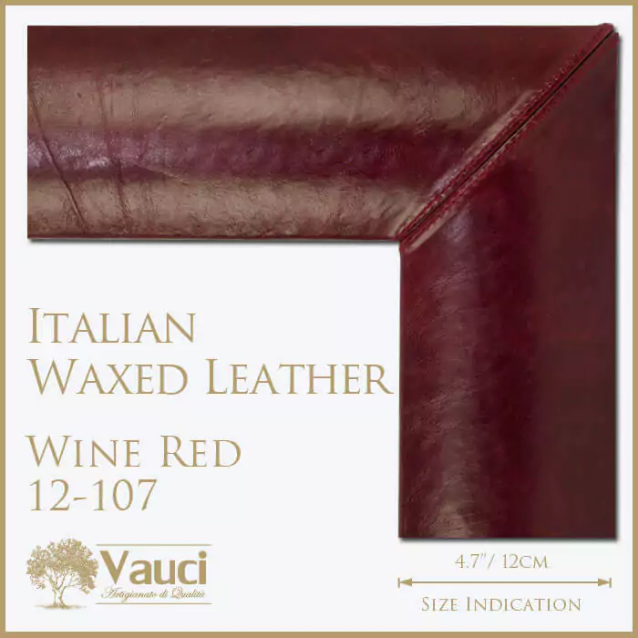 Italian waxed leather wine red vauci frame with its size indication on a white background.