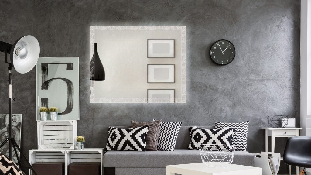 Grand Mirrors' Geometrical Etch Mirror in room with cool black and white accents