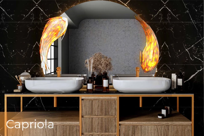 Capriola bulb over a sophisticated bathroom sink on  circular shaped led mirror lamp from Abu Dhabi.