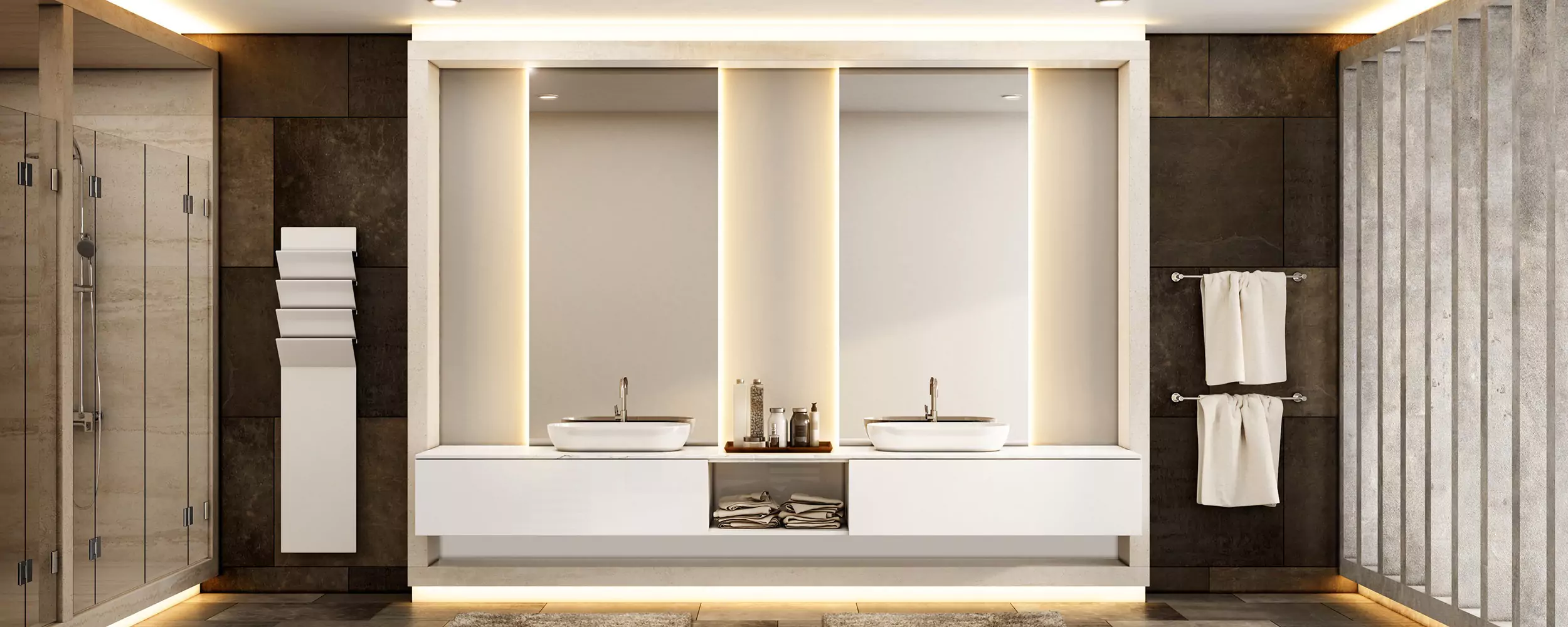 Two backlit mirrors mounted on an opulent bathroom wall from Abu Dhabi.