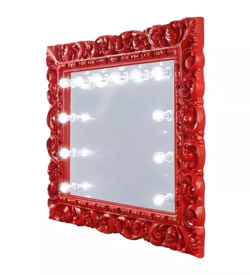 Ajman glossy red ornate frame, surrounding a mirror with a set of lights installed on its surface.