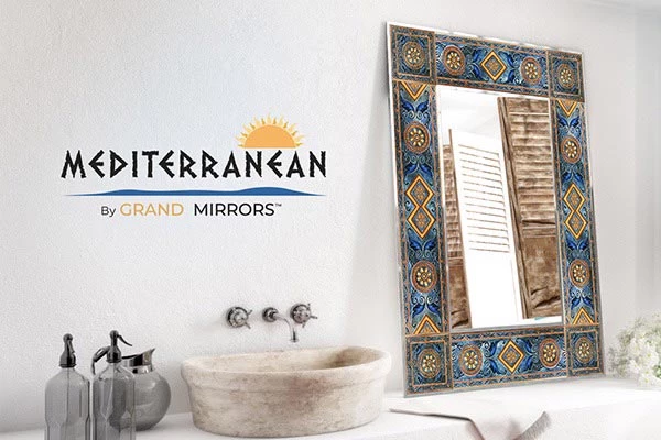 Mediterranean themed bathroom with Made to Measure Lighted Mirror, intricate frame, and stone sink.