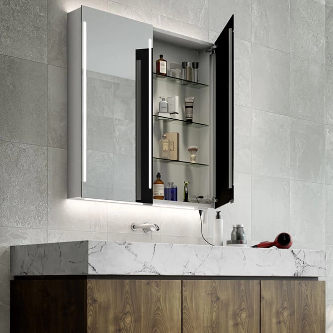 Custom cabinet mirror in a bathroom containing bottles and has outlet outside from Al Ain.
