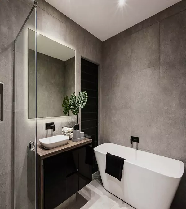 Customized illuminated wall mounted mirrors in simple bathroom designs from Al Ain.