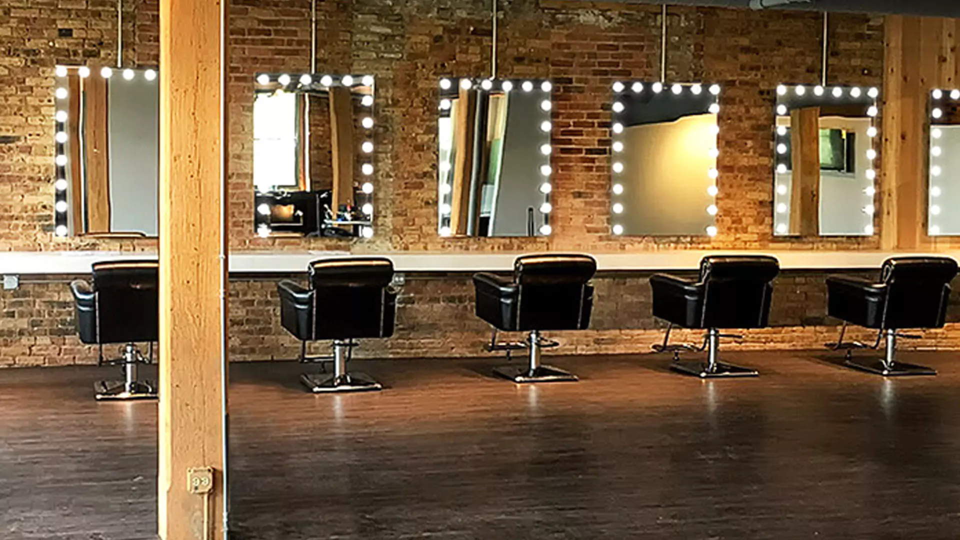 Thumbnail of a classy salon with plenty of Hollywood mirrors and comfortable seats from Bahrain.