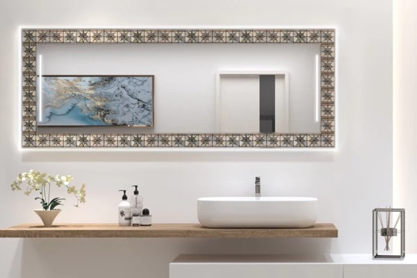 Grand Mirrors Mosaic in nepal valley frame above a white ceramic sink on a wooden table in Dubai.