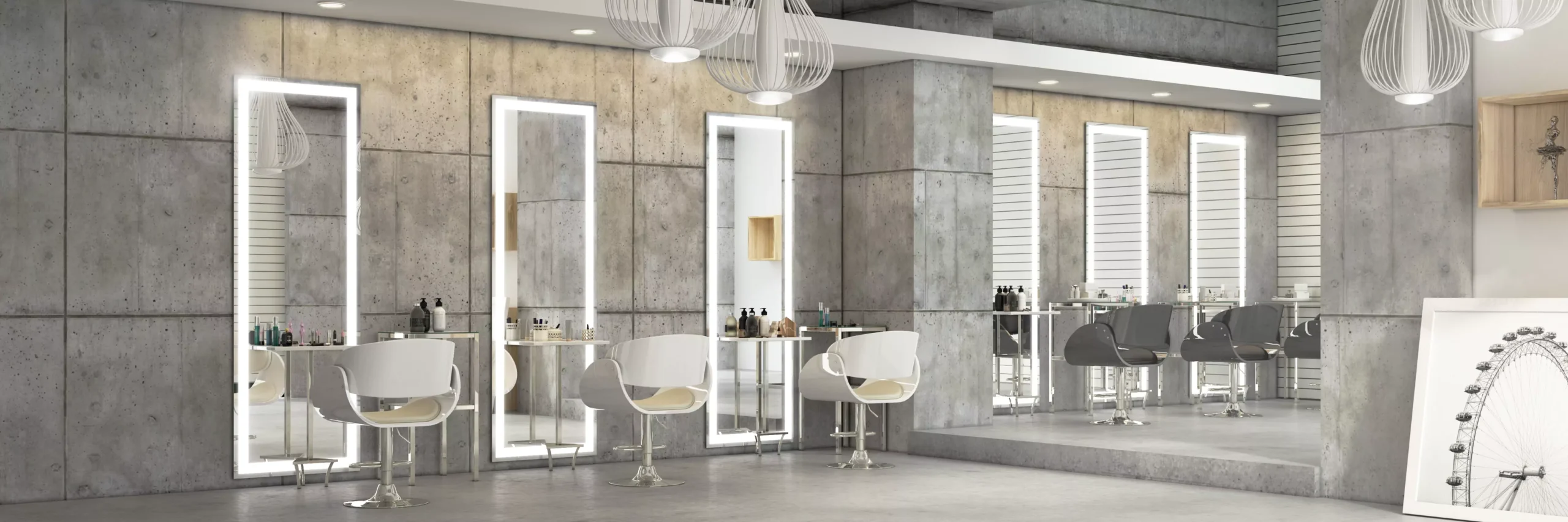 Modern salon with rectangular extra thin lighted Mirrors inset on a rough textured wall in Dubai.