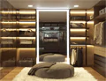 Mini of walk in closet with a Grand Mirrors Lux and a bean bag above a white fur carpet in Dubai.