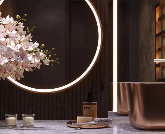 Evervue lighted mirrors on a wooden wall above an orchid, two scented candles, and a soap in Dubai.