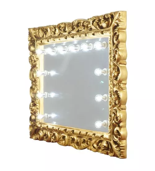 Unique gold framed mirror with illuminated bulbs around, set against a white background in Sharjah.