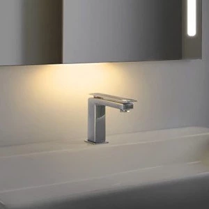 Lighted mirror with a night light that shines beneath the mirror and a concealed sensor in Ajman.