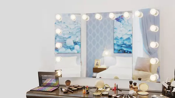 Icon of a makeup necessities table and wall mounted  trifold Hollywood mirror from Kuwait