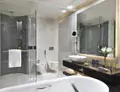 Small of elegant mirror with a backlit that creates illumination for a crisp reflection from Oman.