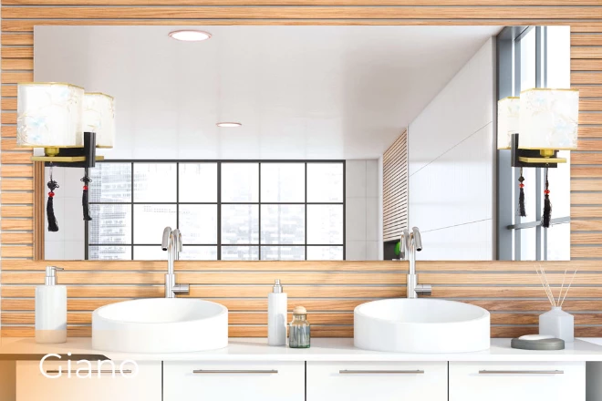 Above the white sinks, on a gorgeous wooden panel, is a Giano lamp versatile mirror from Abu Dhabi.