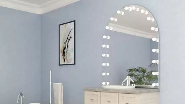 Icon of bathroom sink with a Hollywood mirror in the shape of arch over a filing cabinet from Oman.
