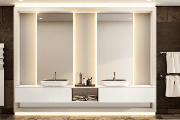 Grand Mirrors eclipse with two ceramic wash basins on a white cabinet in a modern bathroom in Oman.