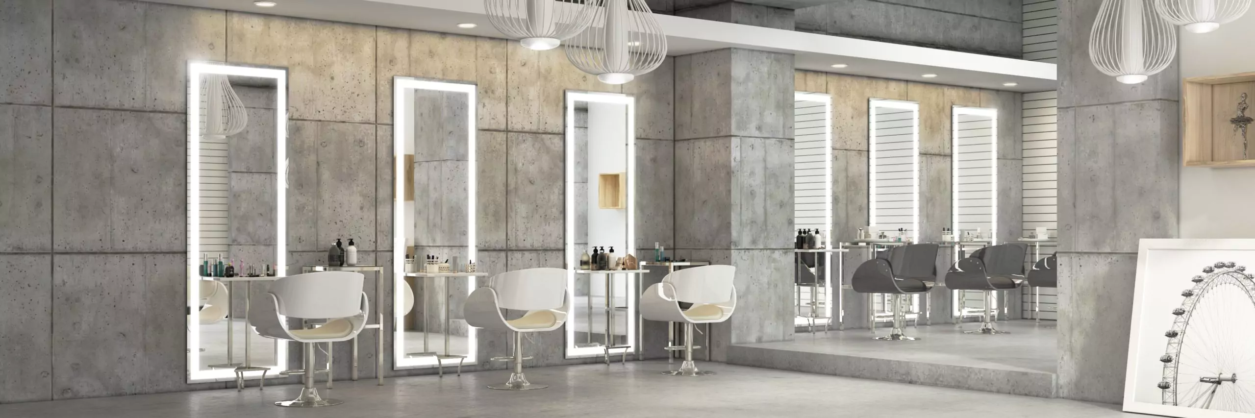 Oman beauty salon with large LED lit mirrors, chairs in black and white, and bottles of cosmetics.
