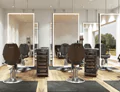 Preview of hair salon with energy efficient mirrors, salon chairs, and inventory carts in Bahrain.