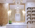 In a bathroom with golden walls, a small led light up mirror with ribolla lamp above sink in Ajman.