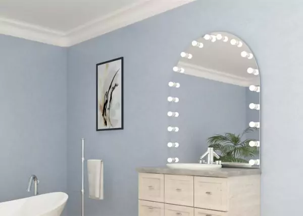 Bathroom sink, white, file cabinet over custom made, arched Hollywood mirror from Riyadh.
