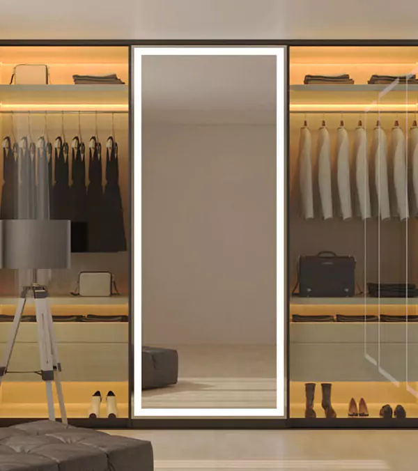 Mini of dressing room in Sharjah with a closet full of hung clothes and evervue lighted mirrors.
