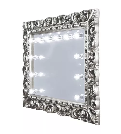 Silver ornate framed mirror with built-in light bulbs on the mirrored surface in Sharjah.