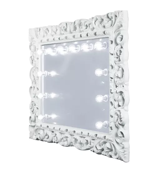 Ornate white frame mirror with illuminated bulbs attached around the glass in Dubai.