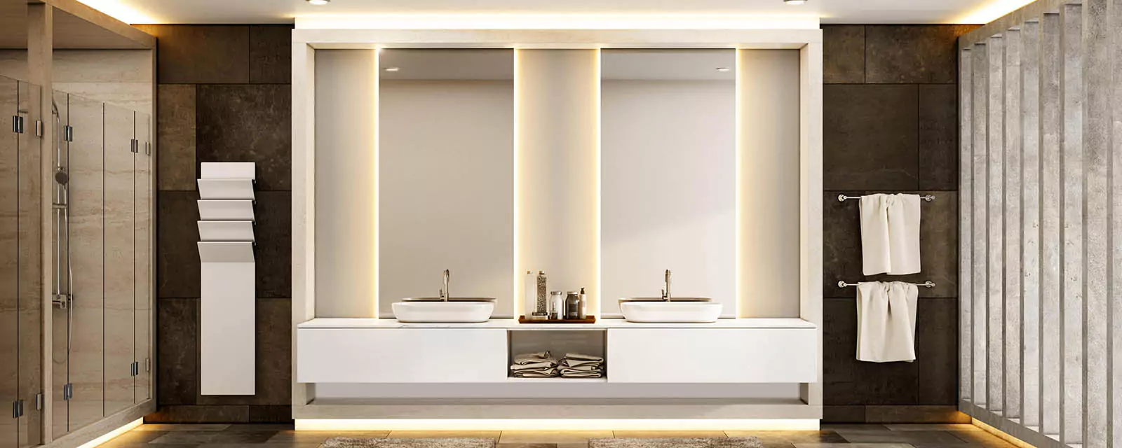 An elegant and wide bathroom sink features two Grand Mirrors with backlighting fitted from Dubai.