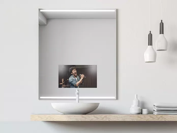Mirror TV set over a single sink with pendant lamps on the right side.