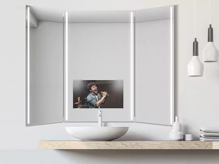 Wooden countertop table with white single basin and trifold cool-lighted, trifold mirror TV.