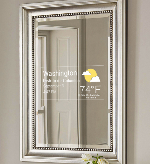 Image featuring a silver frame smart mirror TV with a weather display, offering a stylish and informative viewing experience.