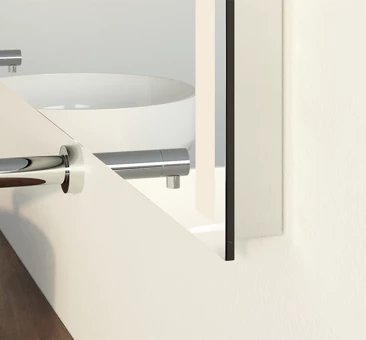Wide mirror installed in between the wall.