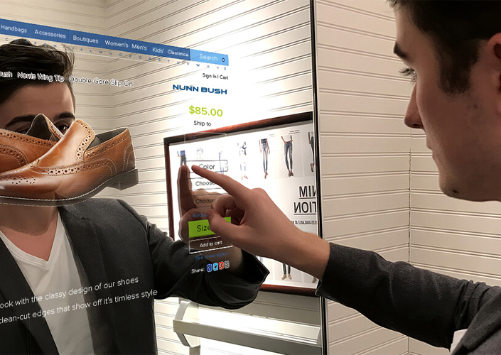MirrorVue Mirror TV used with Smart Touch System by a man in a clothing store