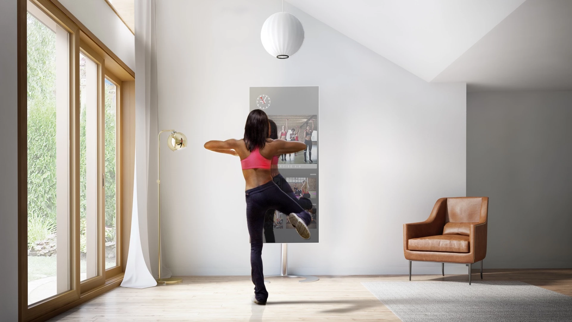 A woman dancing ballet in a beautiful room with Qaio Flex Fitness Mirror TV as her basis.
