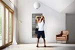 Preview of a man working out while watching high definition videos at smart fitness mirror.