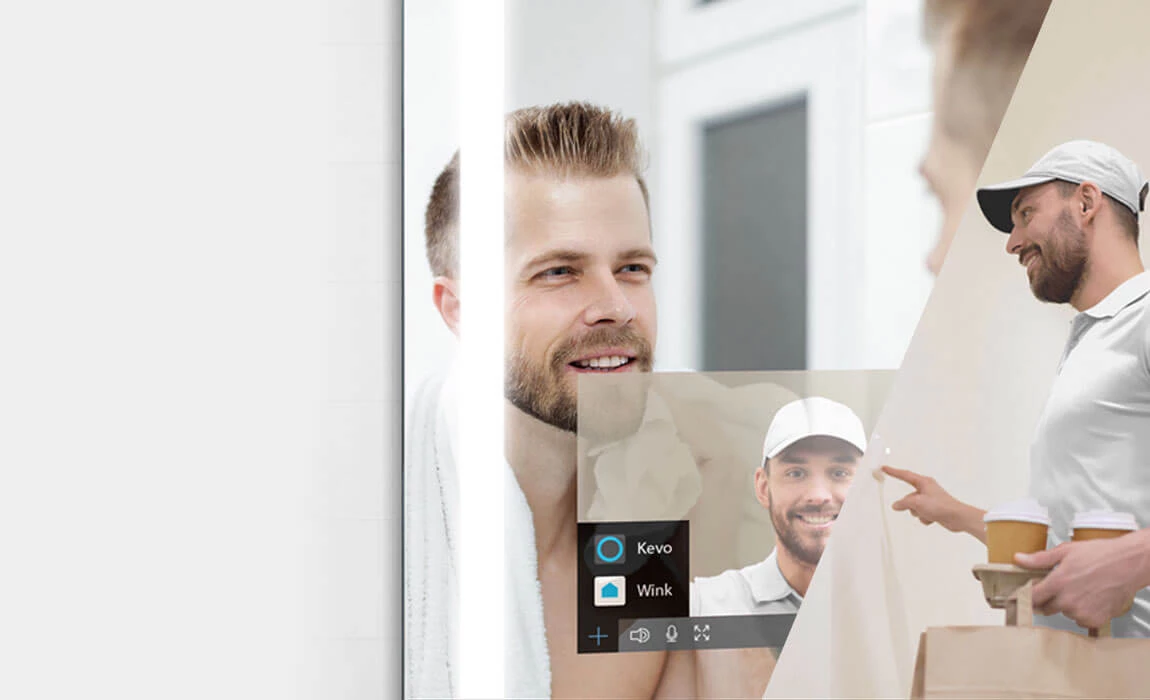 A man engaged in doorbell monitoring on a smart mirror TV.