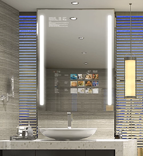 A modern bathroom single sink and a smart mirror with two LED lights installed.