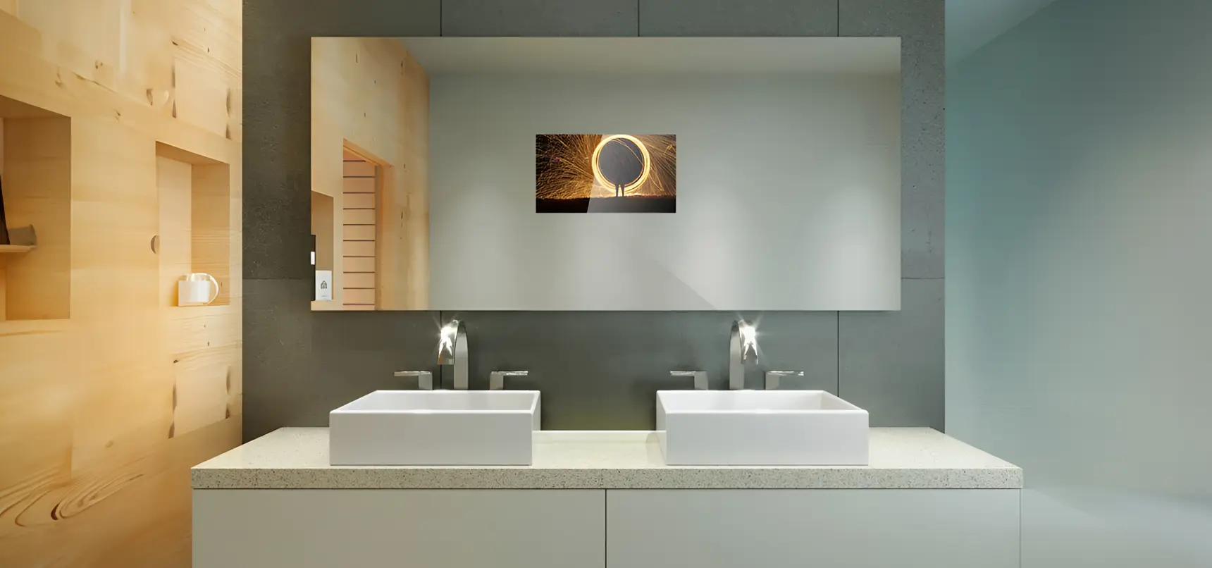 Mirror with a centered TV display on a double sink.